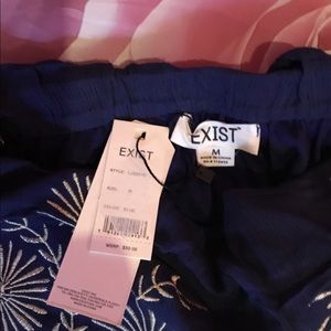 One piece brand new dressy pants with attached top